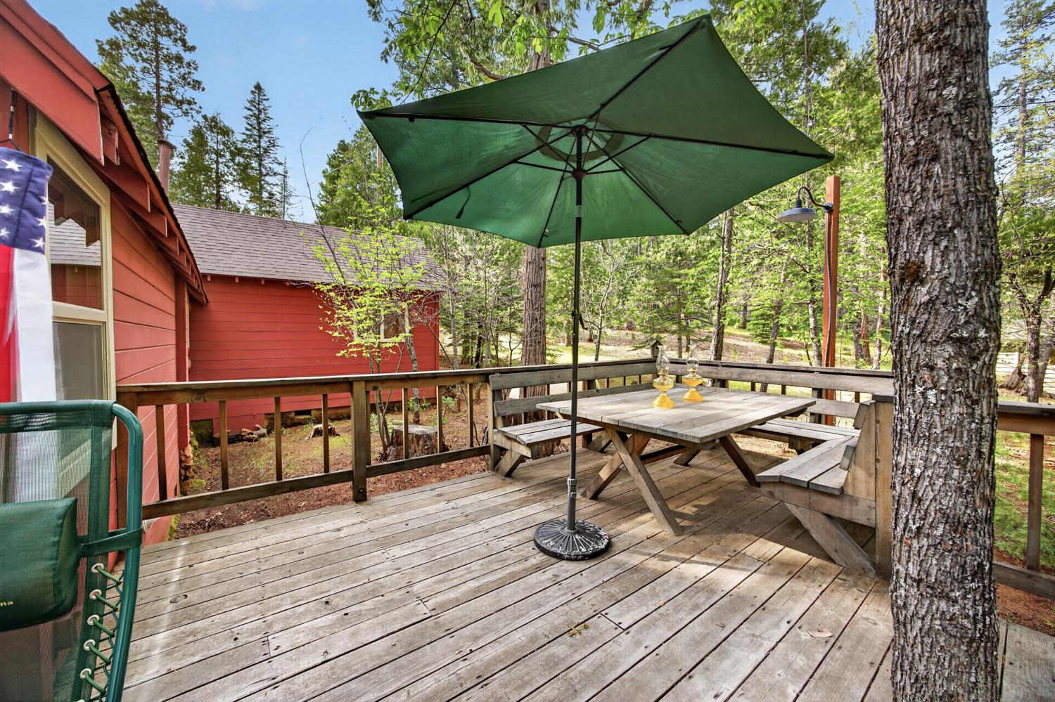 1224 Moran Road Arnold, CA 95223 - Photo 7 of 61 a view of balcony with outdoor seating and wooden floor