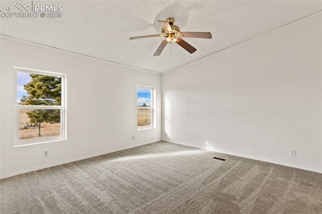 5915 West Condor Road Peyton, CO 80831 - Photo 22 of 50 Primary bedroom