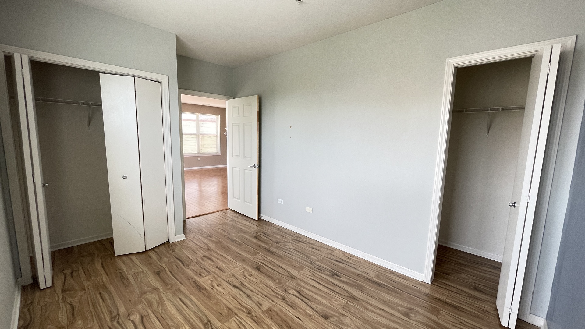 3522 South State Street, Unit 301 Chicago, IL 60609 - Photo 12 of 21 an empty room with wooden floor and closet