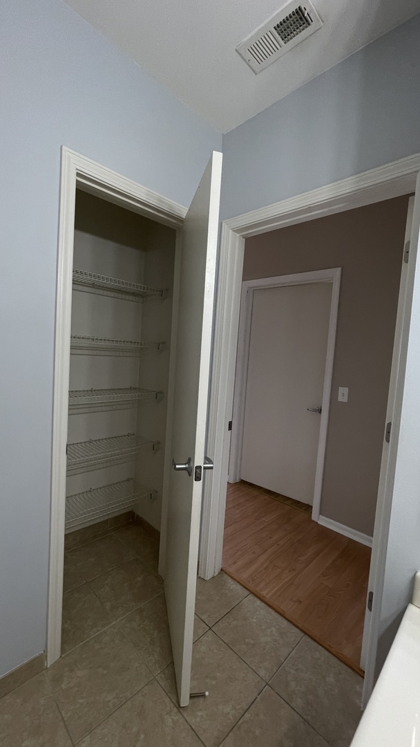 3522 South State Street, Unit 301 Chicago, IL 60609 - Photo 14 of 21 a view of room and an empty space