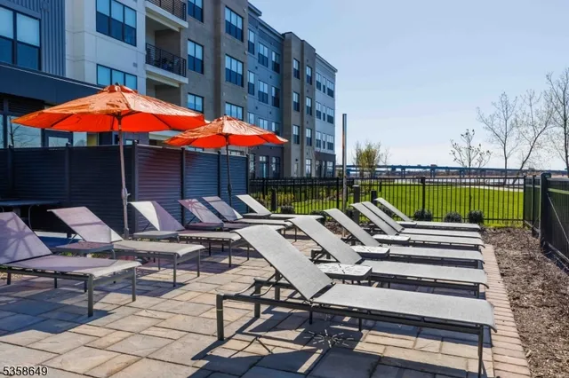 a view of a chairs and tables in the patio