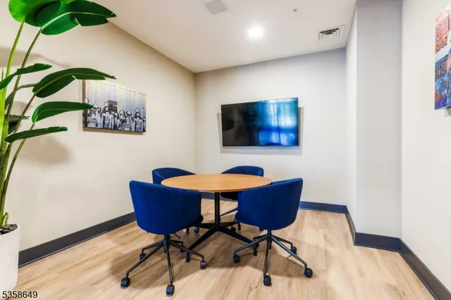 a workspace with furniture and rug