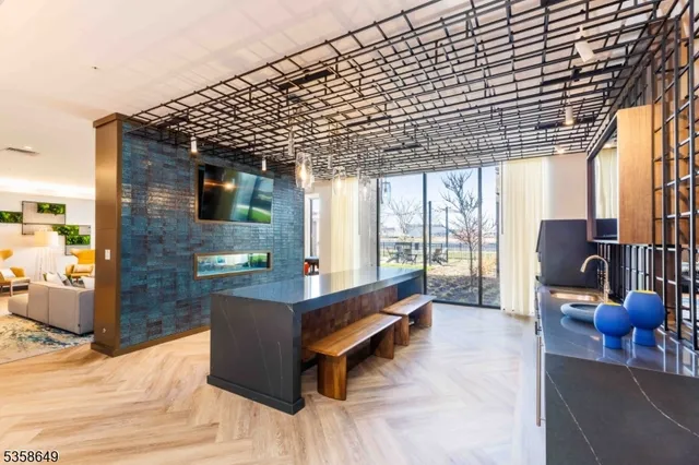 a outdoor space with the couches and dining table with the potted plants