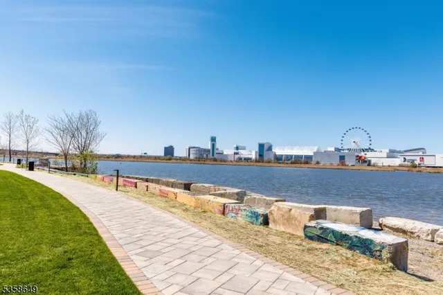a view of a swimming pool with an outdoor space and seating area