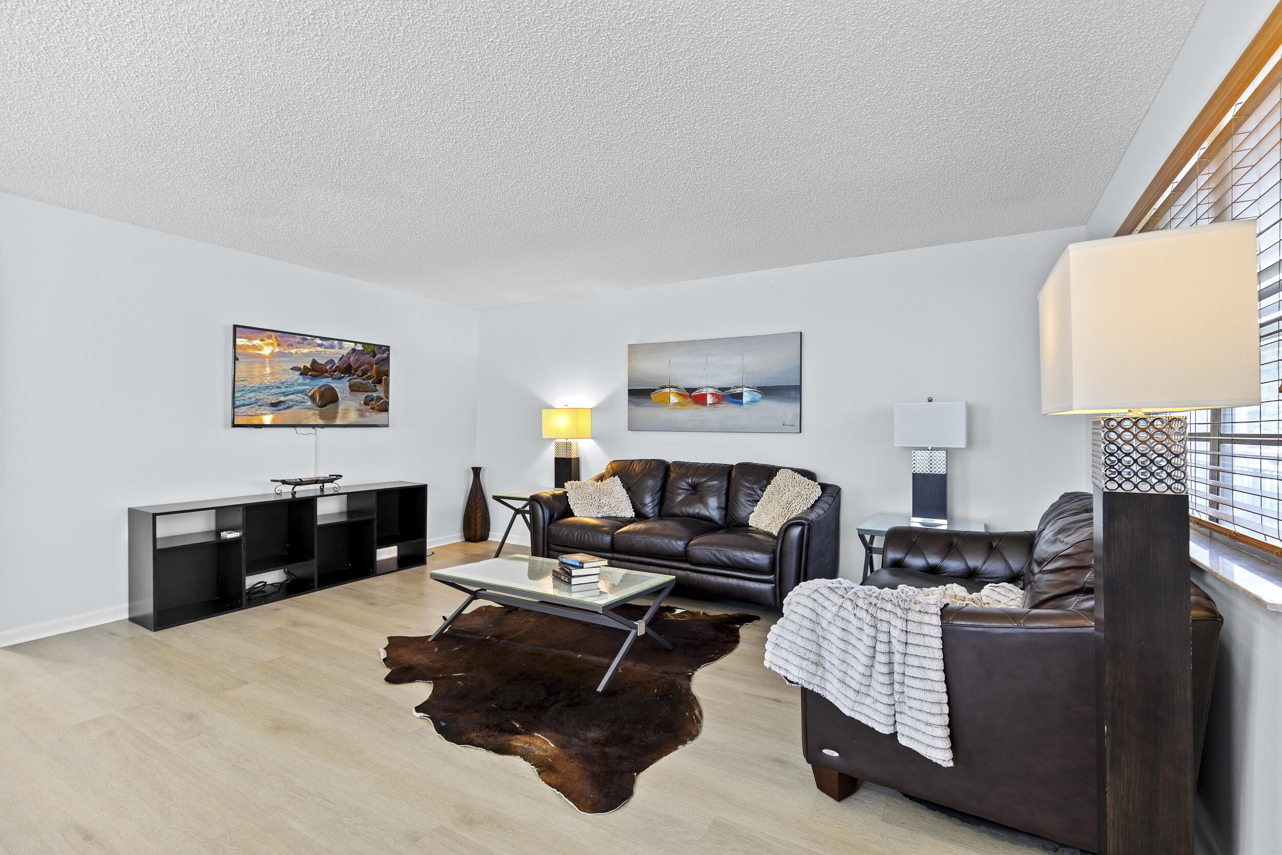 74 Normandy B Delray Beach, FL 33484 - Photo 5 of 21 a living room with furniture