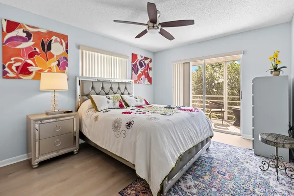 a bedroom with a bed and dresser