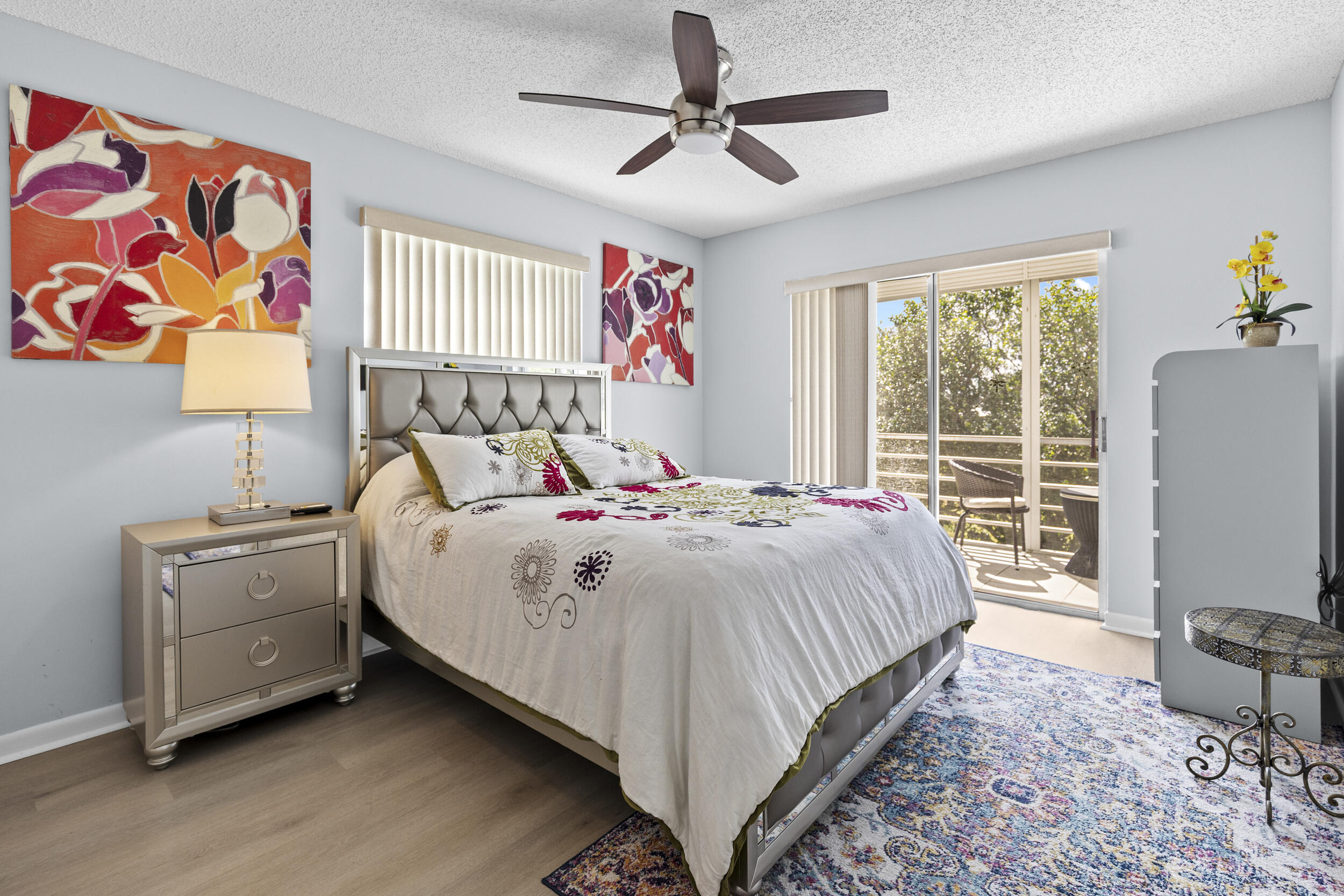 74 Normandy B Delray Beach, FL 33484 - Photo 9 of 21 a bedroom with a bed and a dresser next to a window