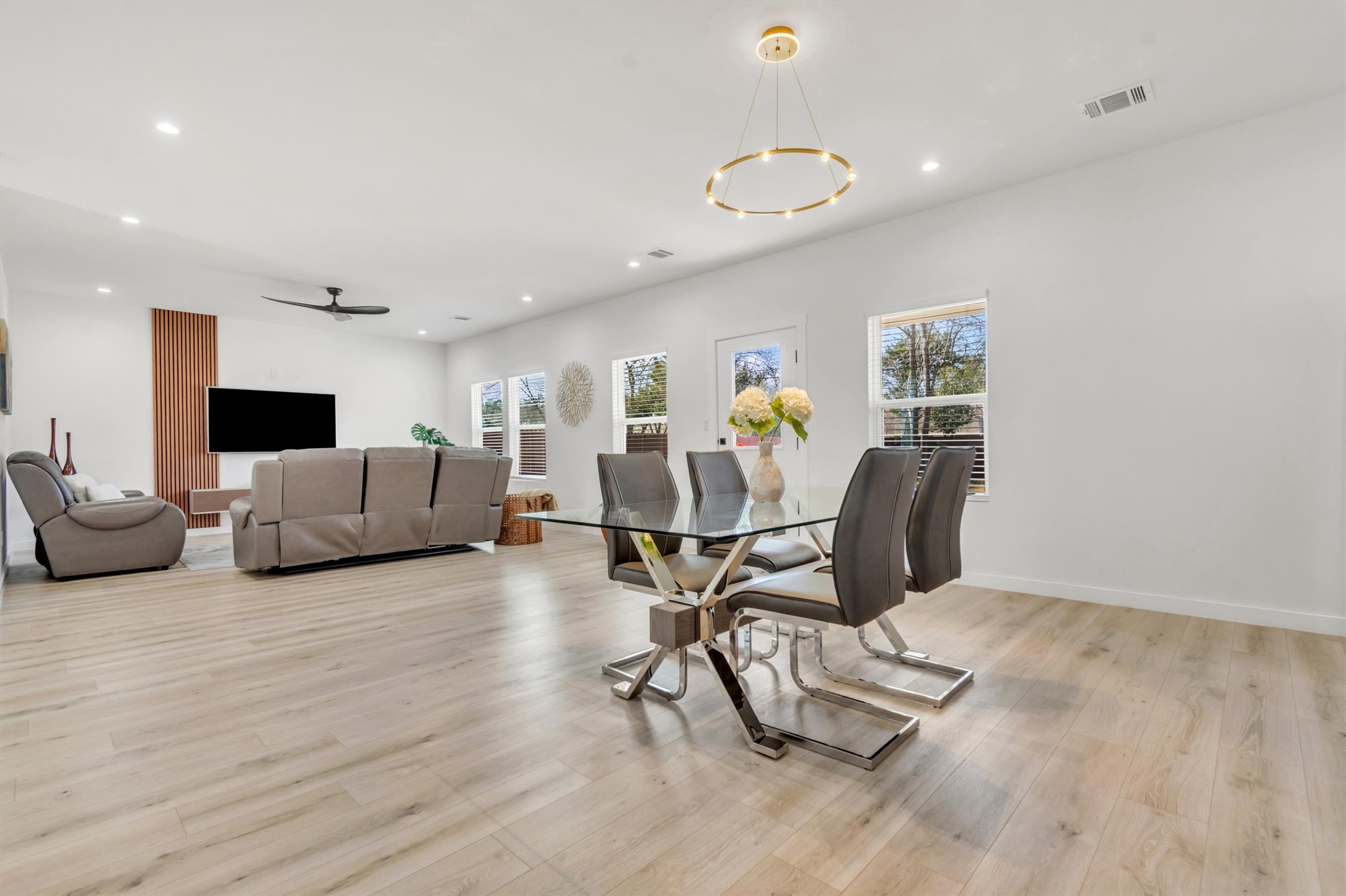 2307 Lathan Lane Taylor, TX 76574 - Photo 11 of 22 a view of a livingroom with furniture and a flat screen tv