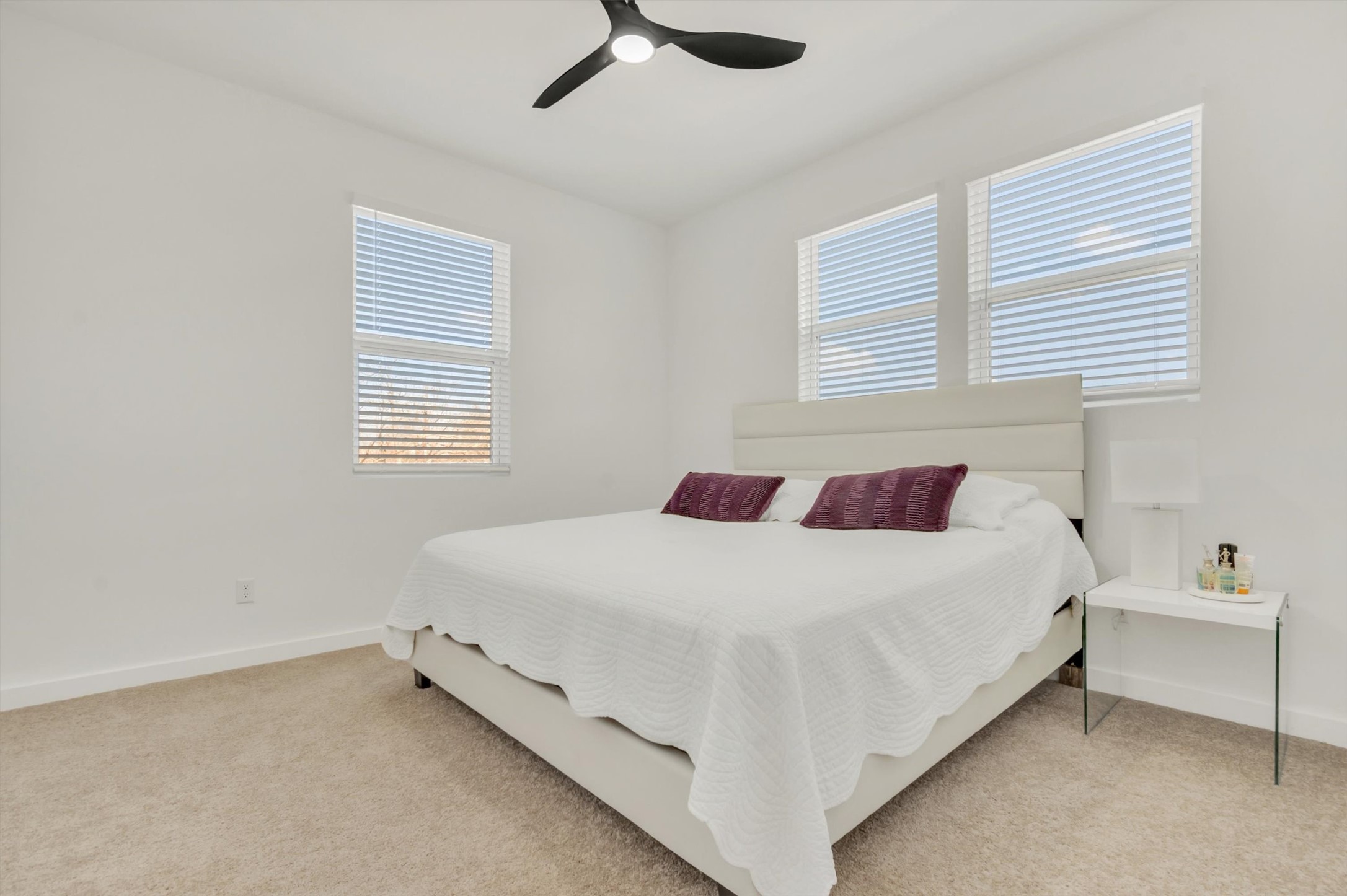 2307 Lathan Lane Taylor, TX 76574 - Photo 19 of 22 a bedroom with a bed and a window