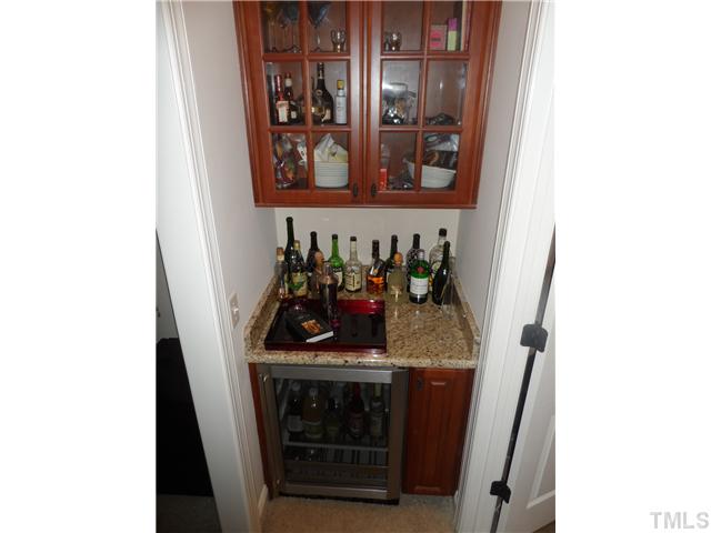 3611 Forward Way Raleigh, NC 27614 - Photo 11 of 25 Morning Bar/Beverage Bar with glass cabinets, beverage cooler and storage