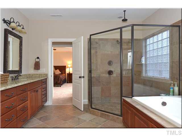 3611 Forward Way Raleigh, NC 27614 - Photo 12 of 25 Gorgeous tile shower with two showerheads and all the space you would ever want! Luxurious jetted spa bathtub