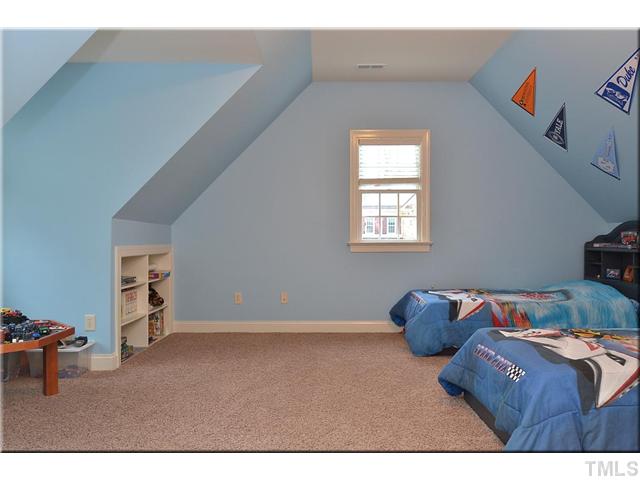 3611 Forward Way Raleigh, NC 27614 - Photo 14 of 25 Bedroom #2 is large enough to share, with built in bookshelves and tons of space for play