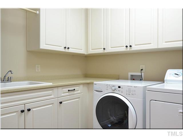 3611 Forward Way Raleigh, NC 27614 - Photo 17 of 25 Spacious walk-in utility room with sink, bar to hang drying clothes, and loads of cabinets ? you will not find a better utility room than this!