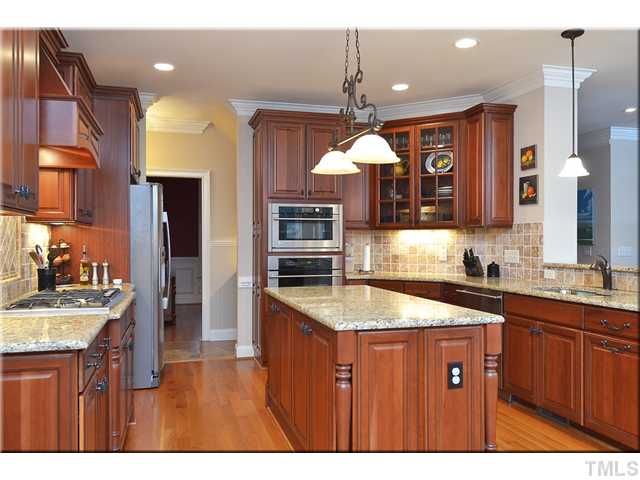 3611 Forward Way Raleigh, NC 27614 - Photo 6 of 25 Amazing chef?s kitchen with five-burner stovetop, Advantium dual microwave/oven in addition to regular oven, and super quiet dishwasher! Gorgeous cabinets, decorative knobs and tile backsplash complete the luxurious look.