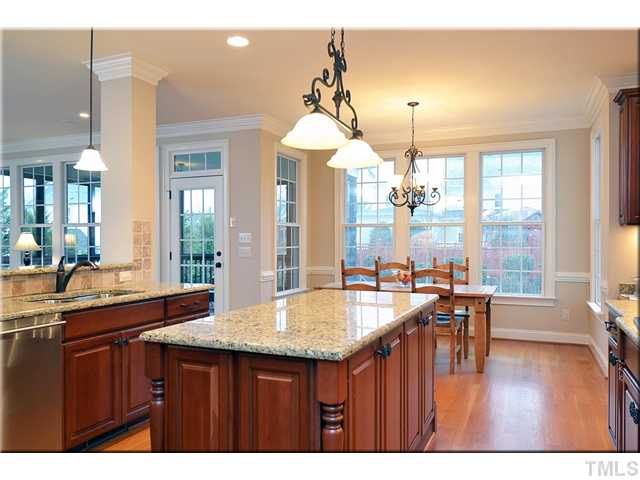 3611 Forward Way Raleigh, NC 27614 - Photo 7 of 25 This island is a cook?s paradise and makes food prep easy! Note the beautiful light fixtures throughout the home.