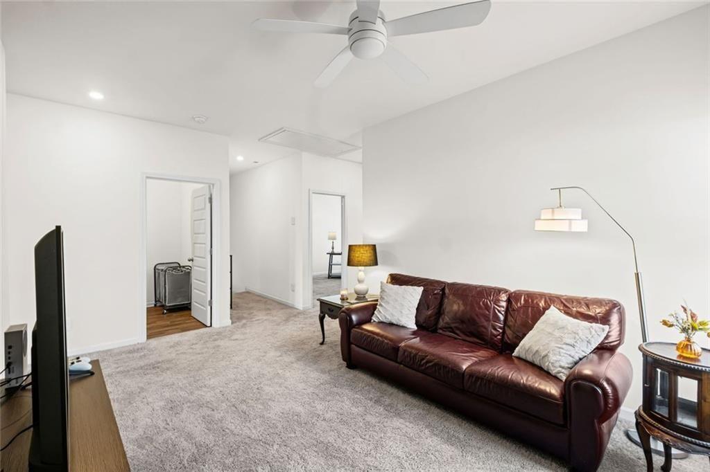 252 Renford Road Ball Ground, GA 30107 - Photo 25 of 36 a living room with furniture