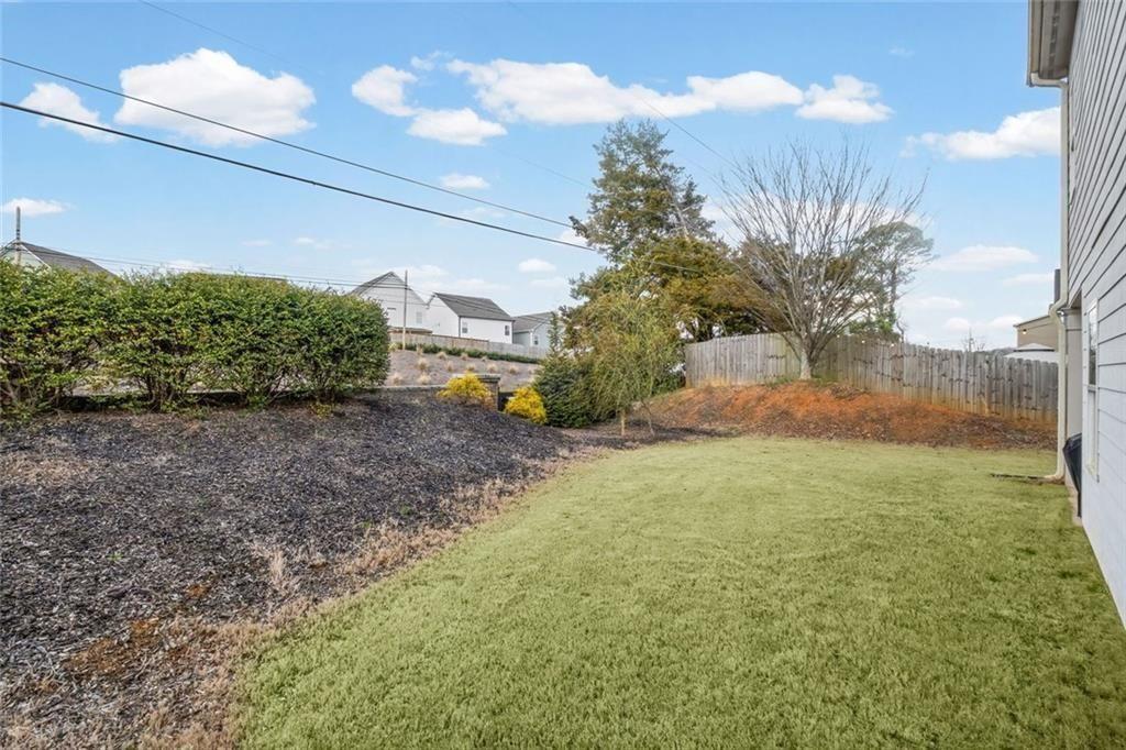 252 Renford Road Ball Ground, GA 30107 - Photo 30 of 36 a view of a yard