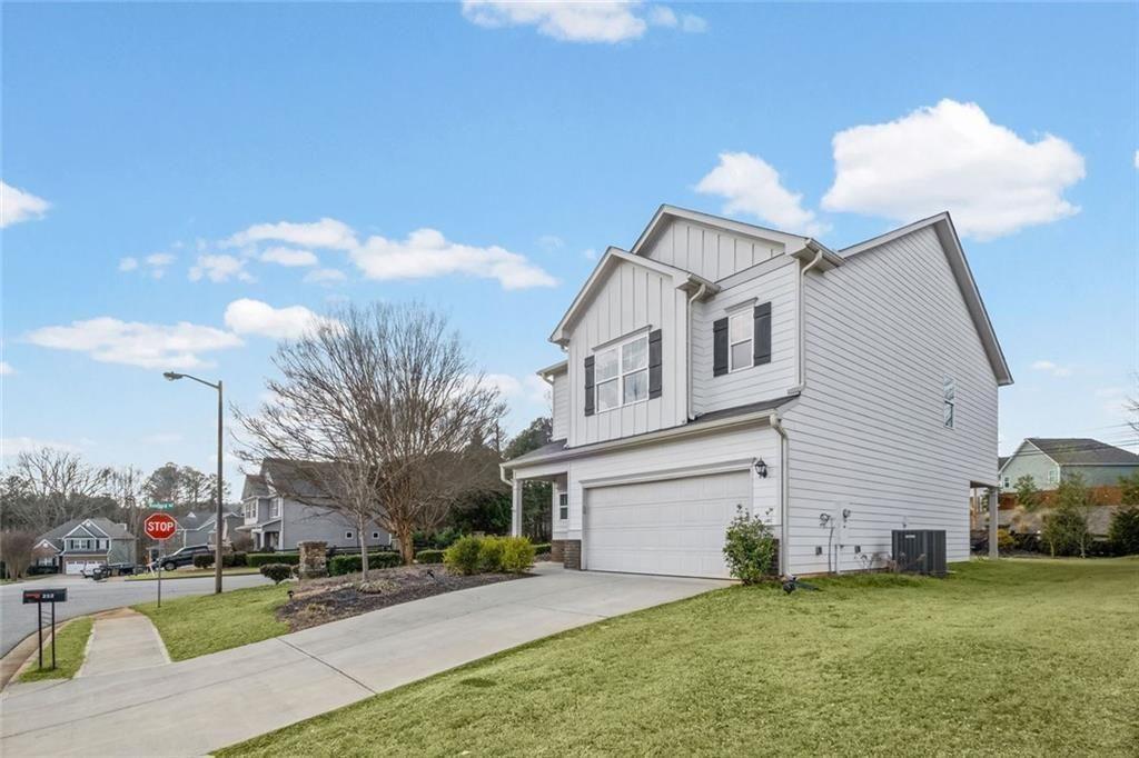 252 Renford Road Ball Ground, GA 30107 - Photo 34 of 36 a view of a house with a backyard