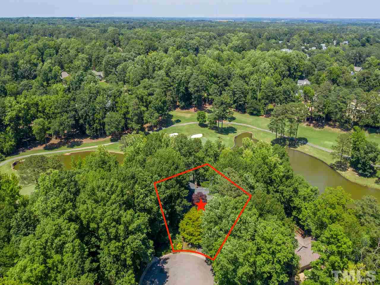 7108 Grandview Court Raleigh, NC 27615 - Photo 2 of 3 an aerial view of residential house with outdoor space and trees all around