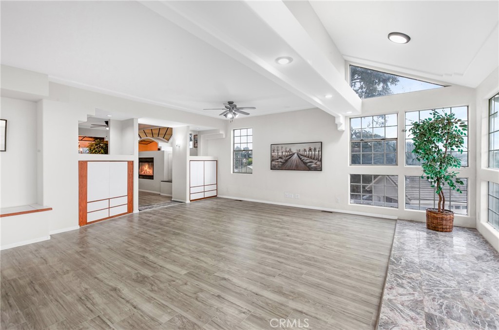 508 Mesa View Drive Arroyo Grande, CA 93420 - Photo 15 of 55 a view of a livingroom with wooden floor and a ceiling fan