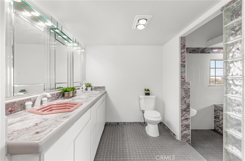 508 Mesa View Drive Arroyo Grande, CA 93420 - Photo 32 of 55 a bathroom with a sink a toilet and shower