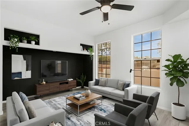 a living room with furniture and a window