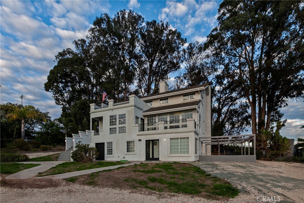 508 Mesa View Drive Arroyo Grande, CA 93420 - Photo 4 of 55 front view of a white house with a tree