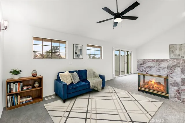 a view of an empty room and wooden floor
