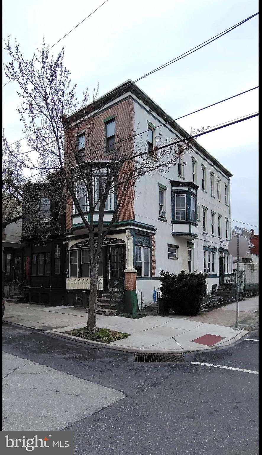 6312 Vine Street Philadelphia, PA 19139 - Photo 1 of 11 a front view of a house with a street