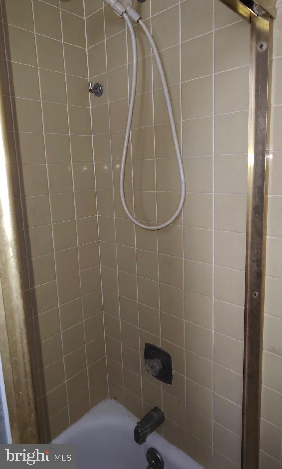 6312 Vine Street Philadelphia, PA 19139 - Photo 9 of 11 a bathroom with a shower
