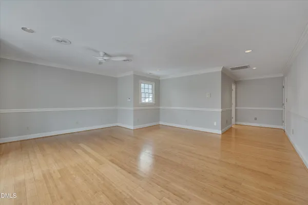 a view of a hallway with windows