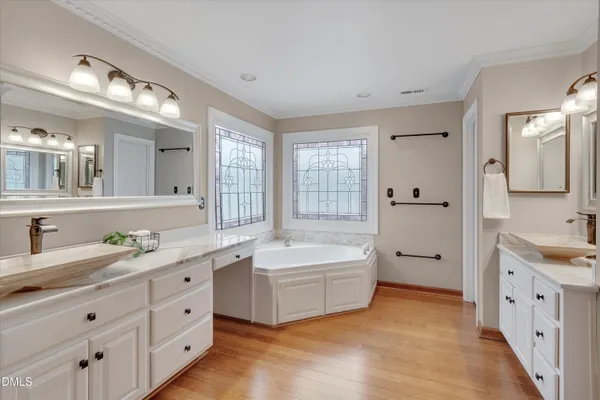 an empty room with a ceiling fan and window