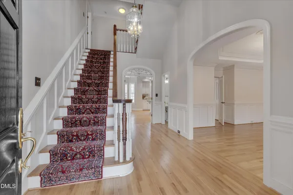 a view of entryway with wooden floor