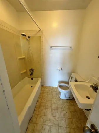 a bathroom with a sink and a bathtub
