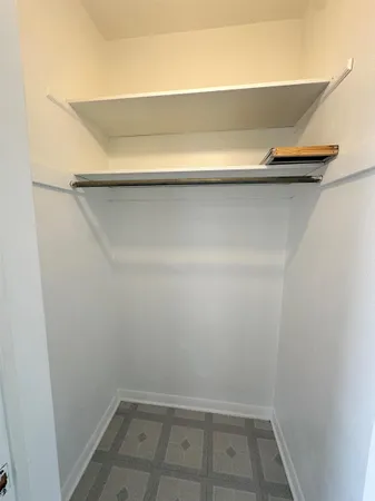 a kitchen with stainless steel appliances a refrigerator a sink