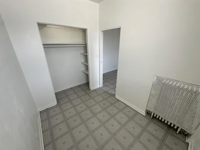 an empty room with a door