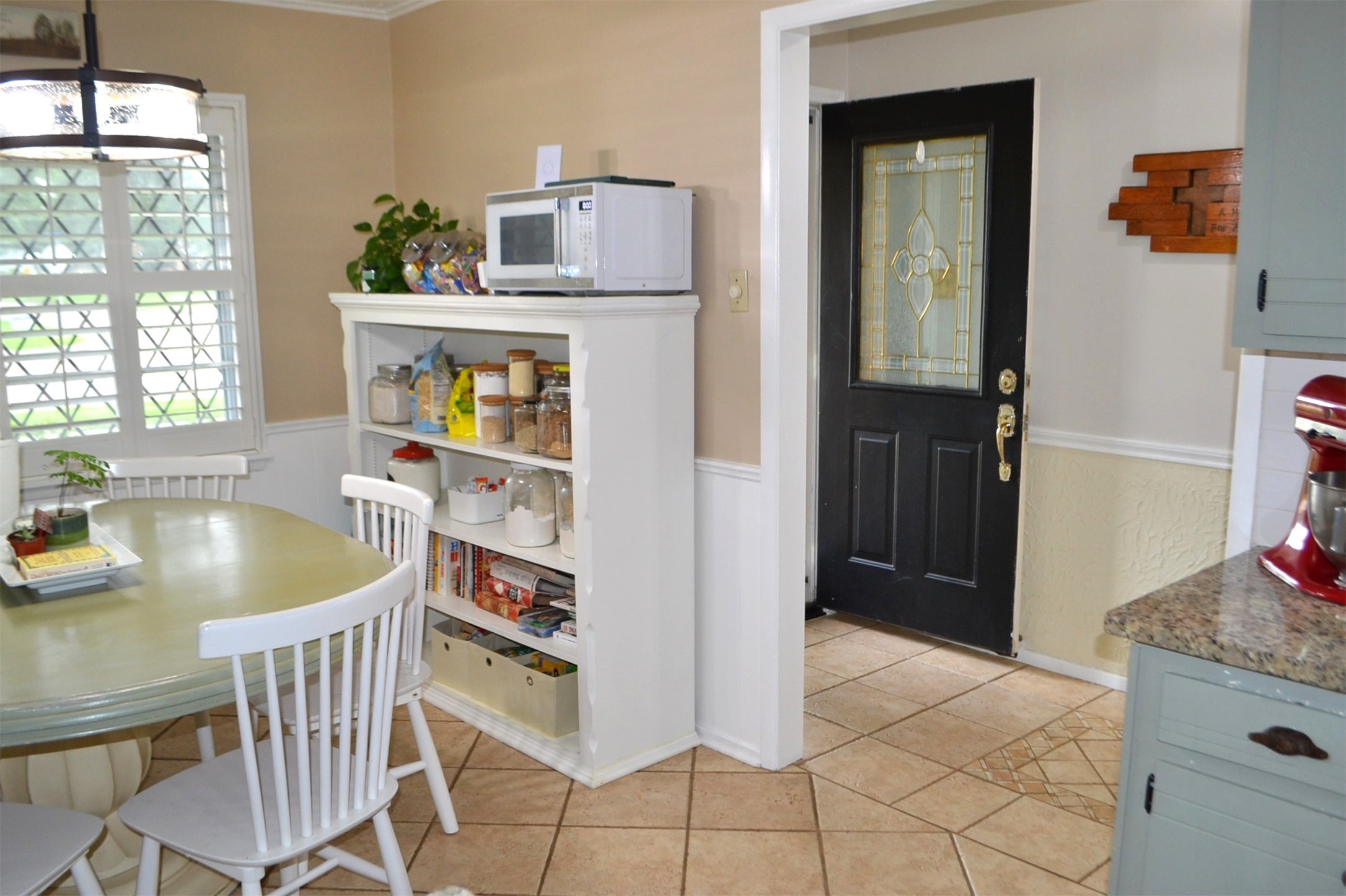 610 East X Street Deer Park, TX 77536 - Photo 15 of 44 a kitchen with a sink a stove and a refrigerator