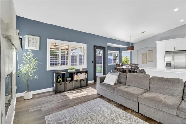 a kitchen with stainless steel appliances a refrigerator sink and stove