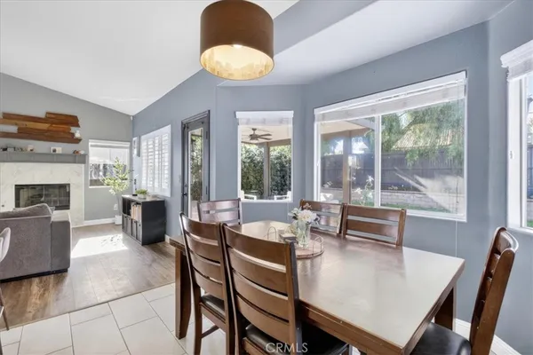 a kitchen with stainless steel appliances kitchen island granite countertop a sink and cabinets