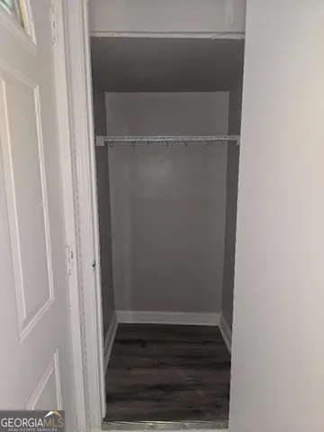 a view of an empty walk in closet
