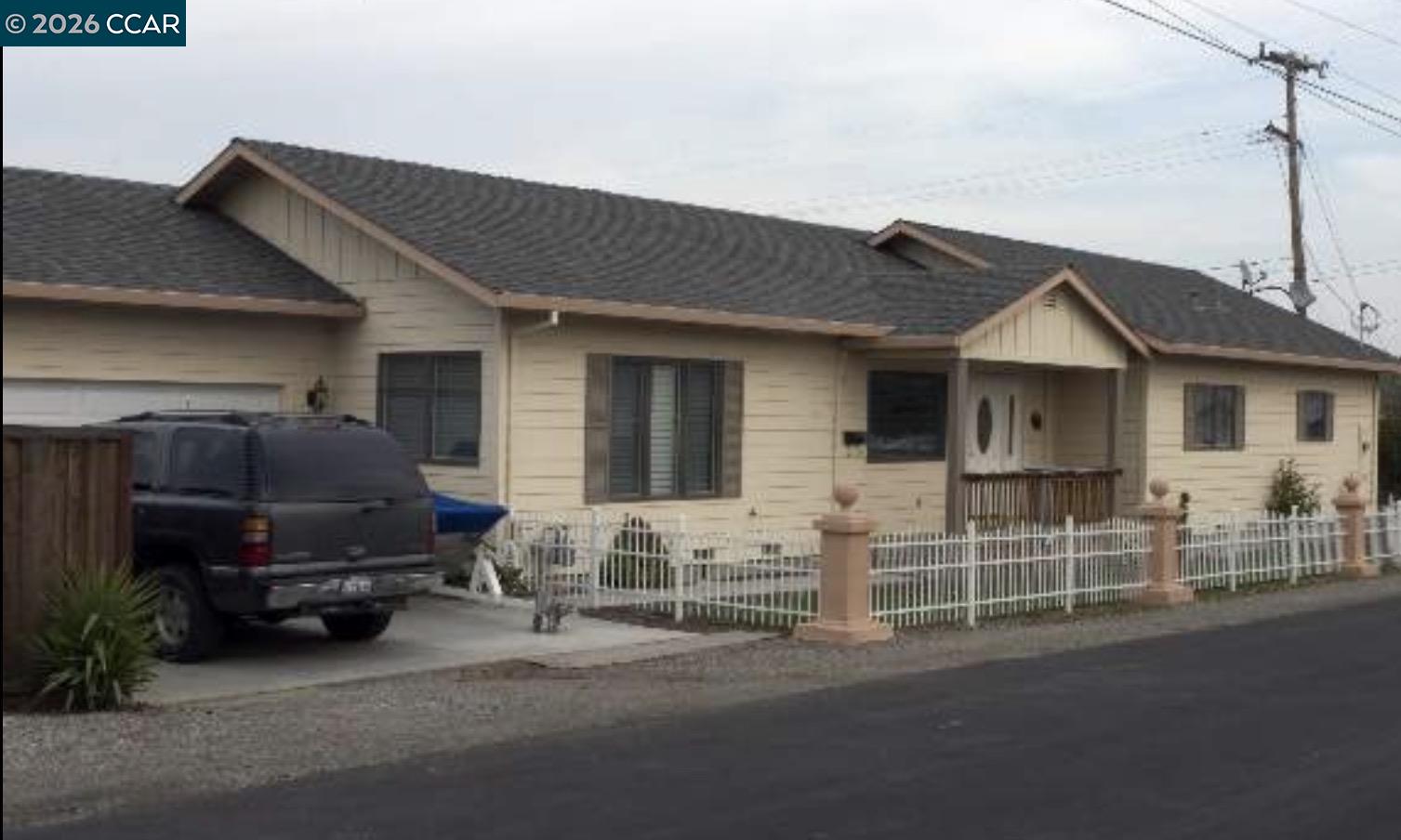 125 Hill Street Bay Point, CA 94565 - Photo 1 of 1 a car parked in front of a house