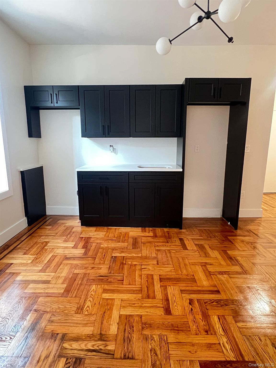 486 East 95th Street, Unit 1R Brooklyn, NY 11212 - Photo 8 of 12 a view of room with a bed