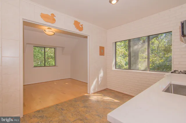 an empty room with windows