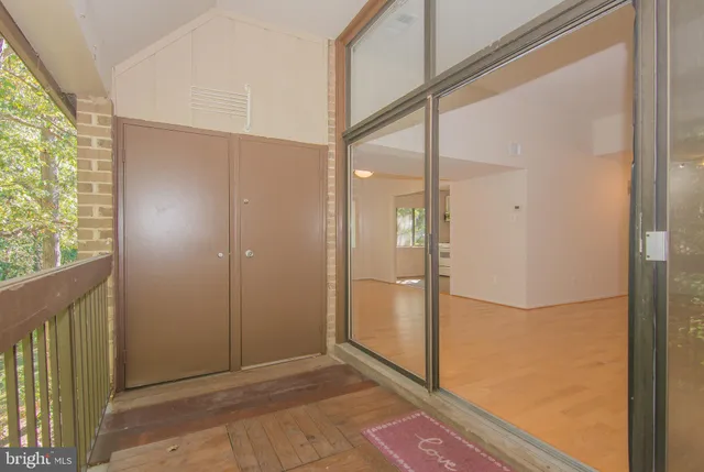 a view of an empty room and window