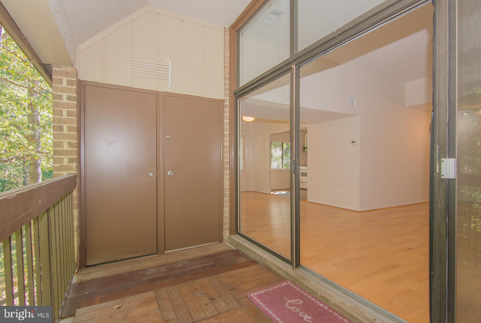 1665 Parkcrest Circle, Unit 301 Reston, VA 20190 - Photo 24 of 30 a view of an empty room and window