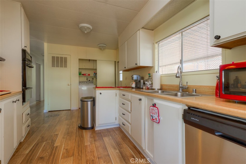 1901 Dayton Road, Unit 133 Chico, CA 95928 - Photo 14 of 36 a kitchen with a sink stove and refrigerator