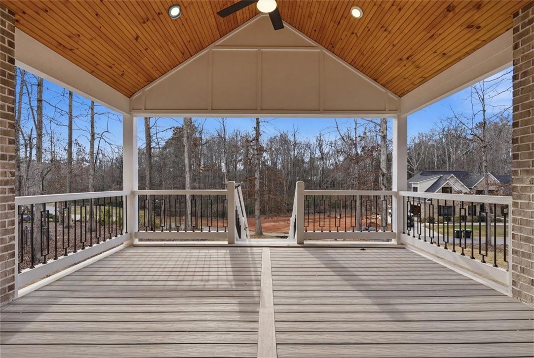 304 Avenue Of Oaks Anderson, SC 29621 - Photo 28 of 38 This outdoor space offers a peaceful retreat with wooded views, perfect for relaxation and entertaining.