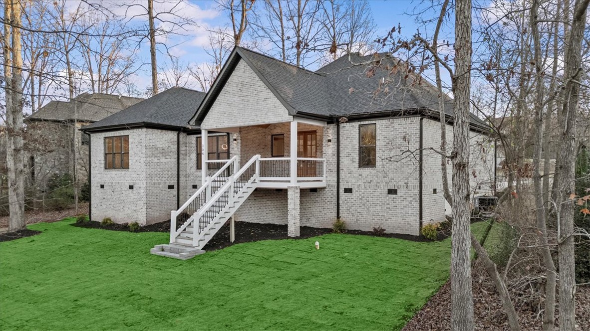304 Avenue Of Oaks Anderson, SC 29621 - Photo 31 of 38 This newly constructed home features a beautiful brick facade and a welcoming patio.