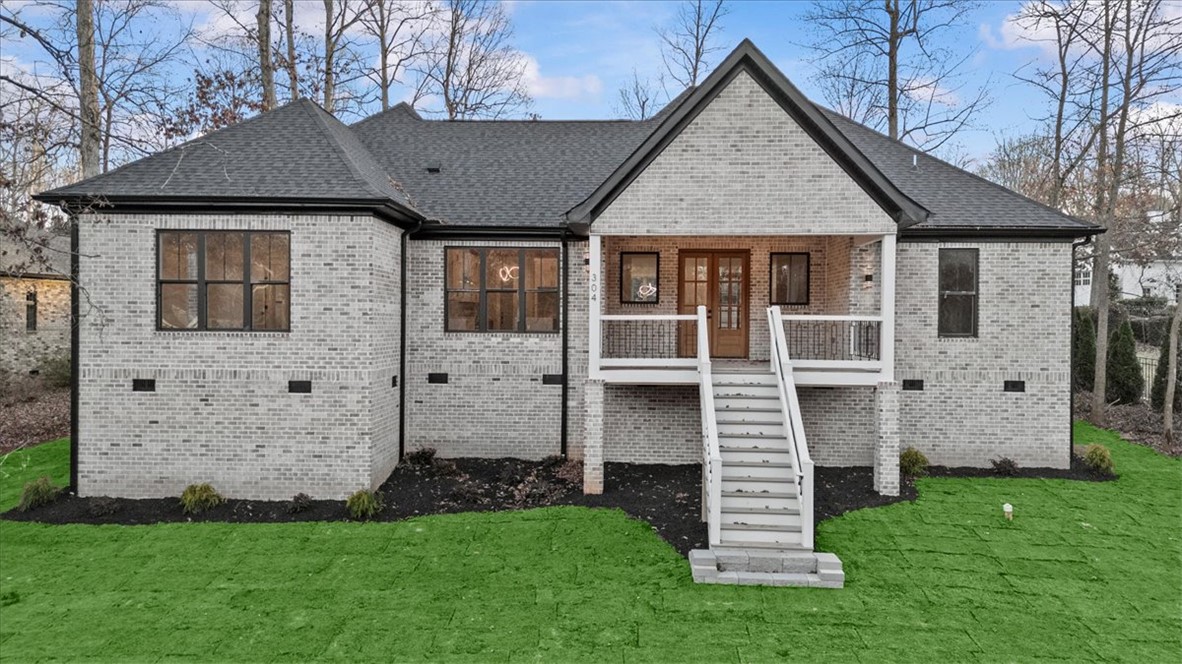 304 Avenue Of Oaks Anderson, SC 29621 - Photo 32 of 38 This charming home offers a perfect blend of modern comfort and classic design with a welcoming front porch.