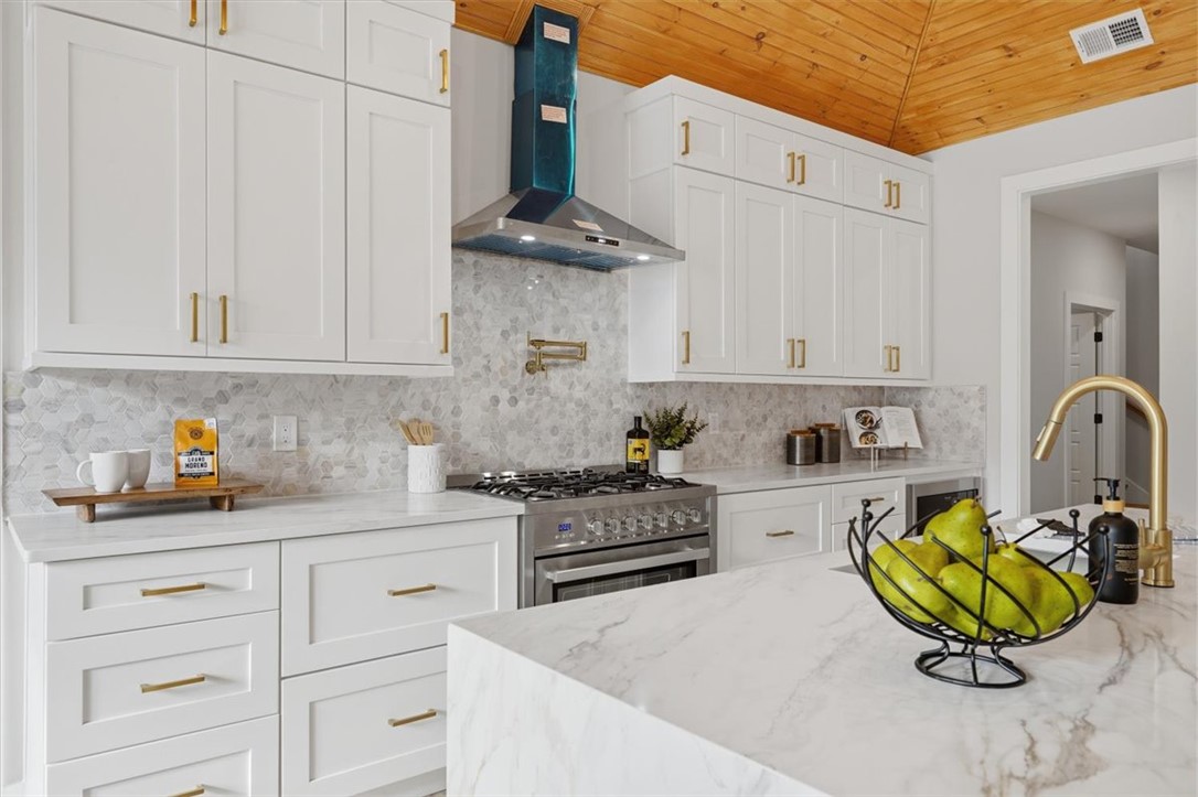304 Avenue Of Oaks Anderson, SC 29621 - Photo 9 of 38 Bright and open, this culinary space features elegant finishes and practical design.